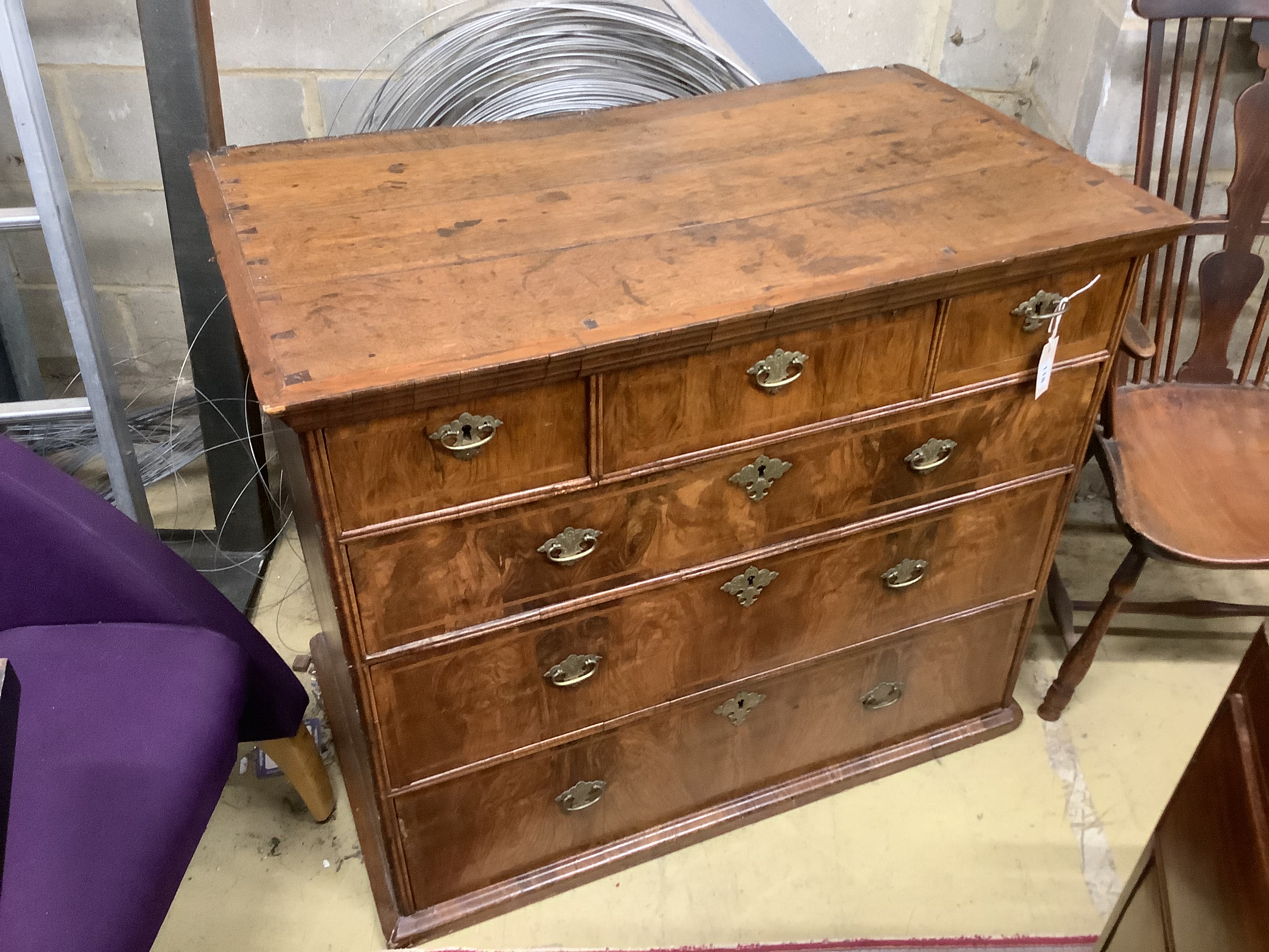 The upper part of a walnut chest on chest, 18th century